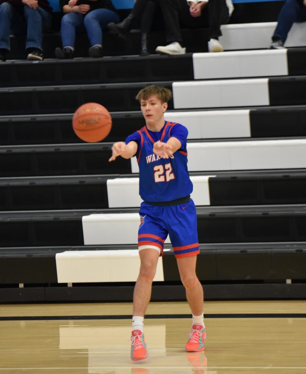  Emigh passes to one of his teammates against River Valley.
