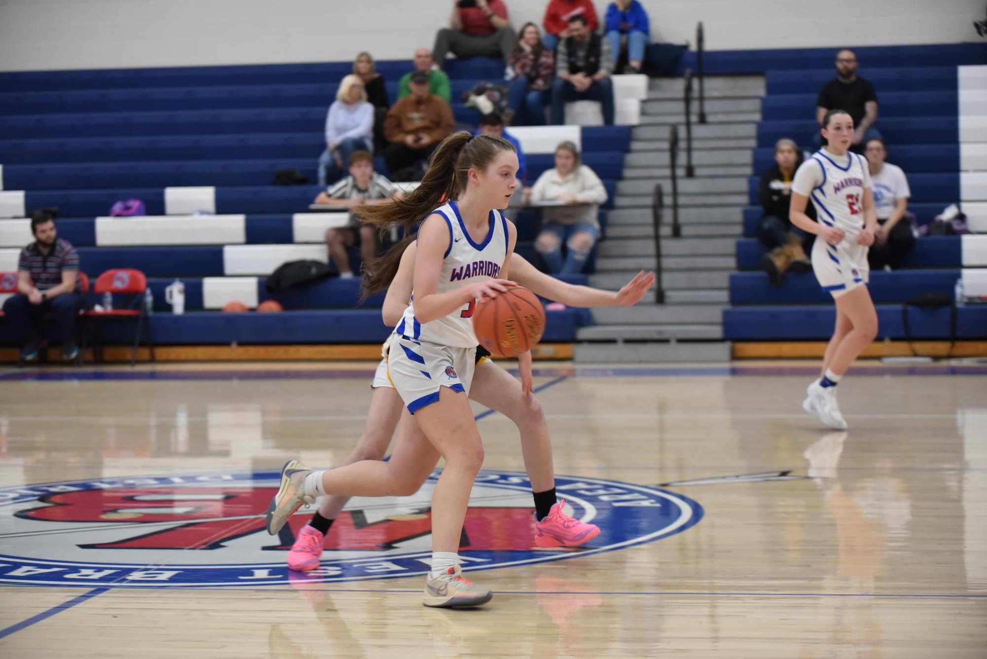 Sarah Guglielmi driving the ball up the court against the Moshannon Valley Damsels