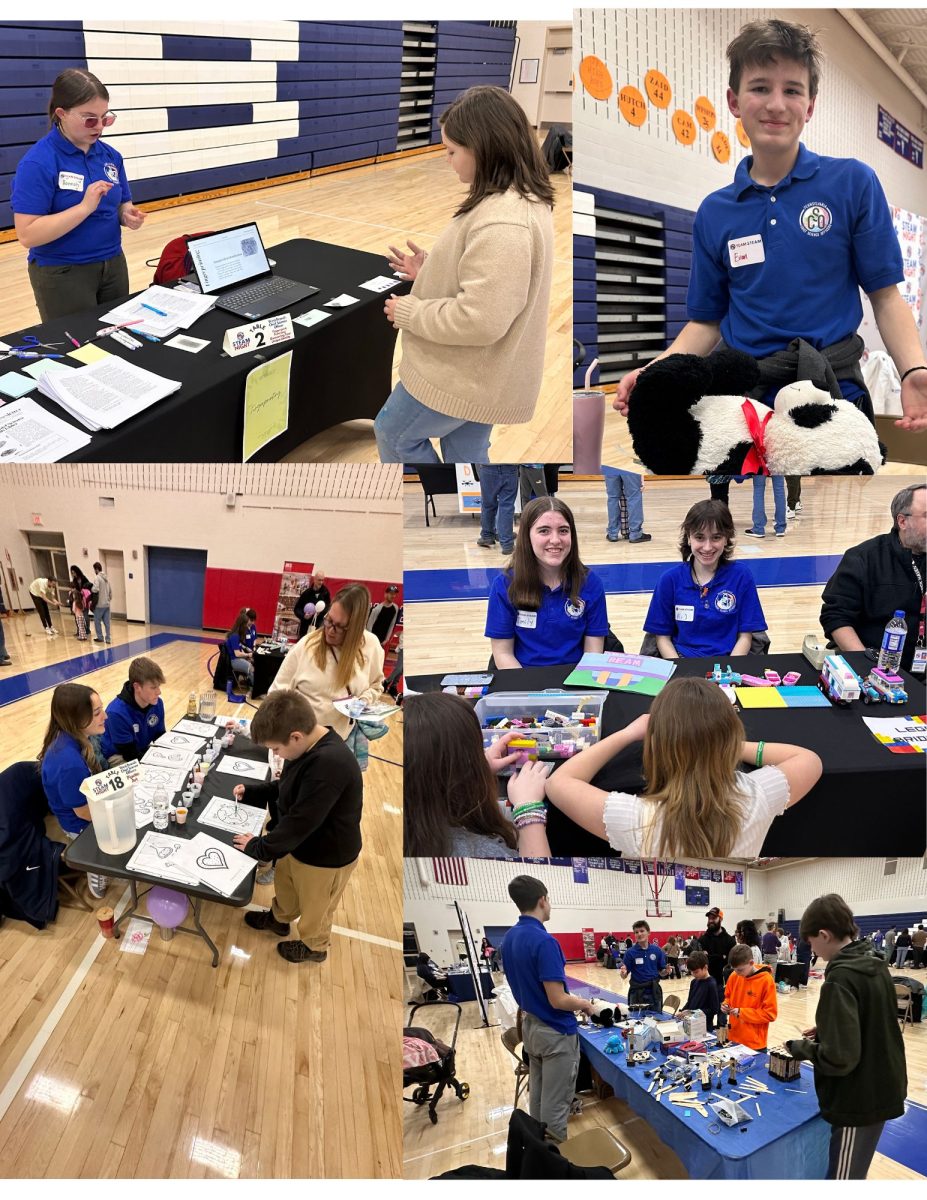 CSOs run STEAM booths at STEAM Night and teach kids about pipettes, bridges, and fingerpainting.