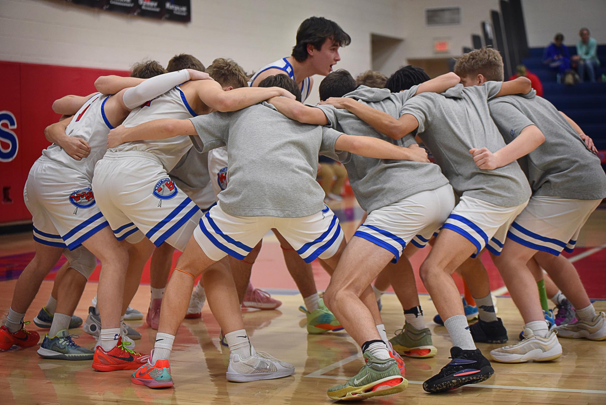 Senior Lukas Colton hyping his teammates up before a very intense game.