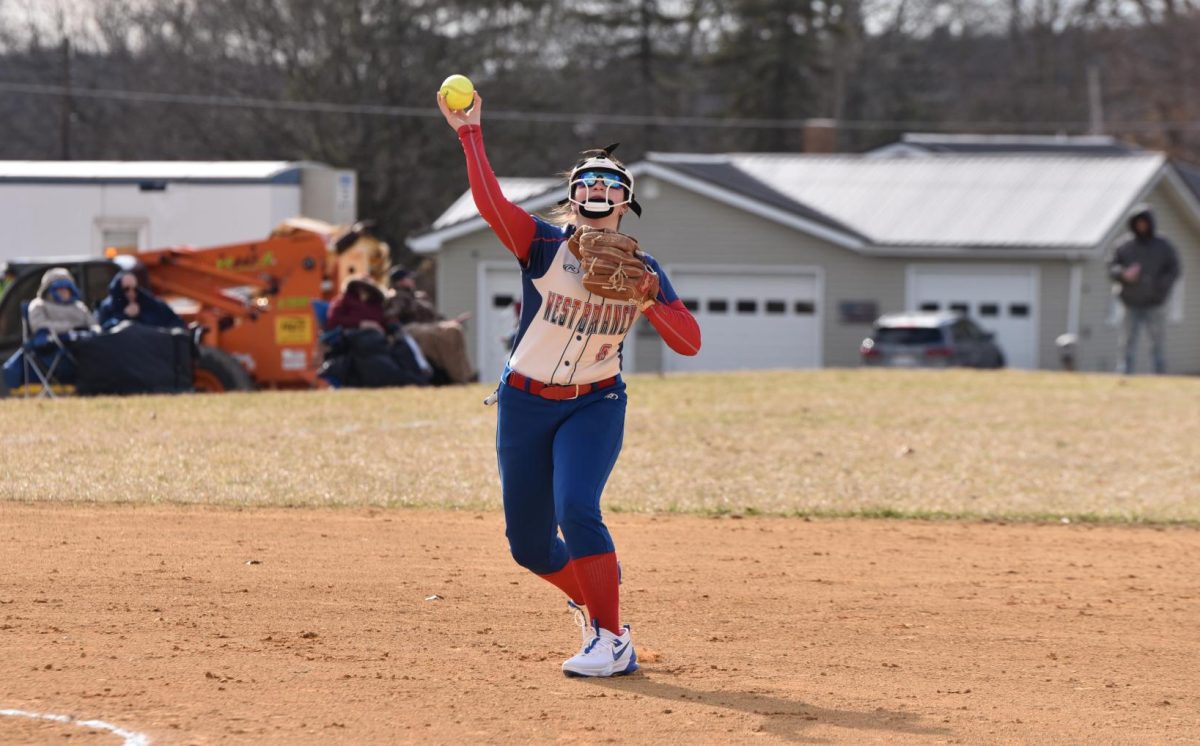 Thompson makes a play by throwing the ball to first base.
