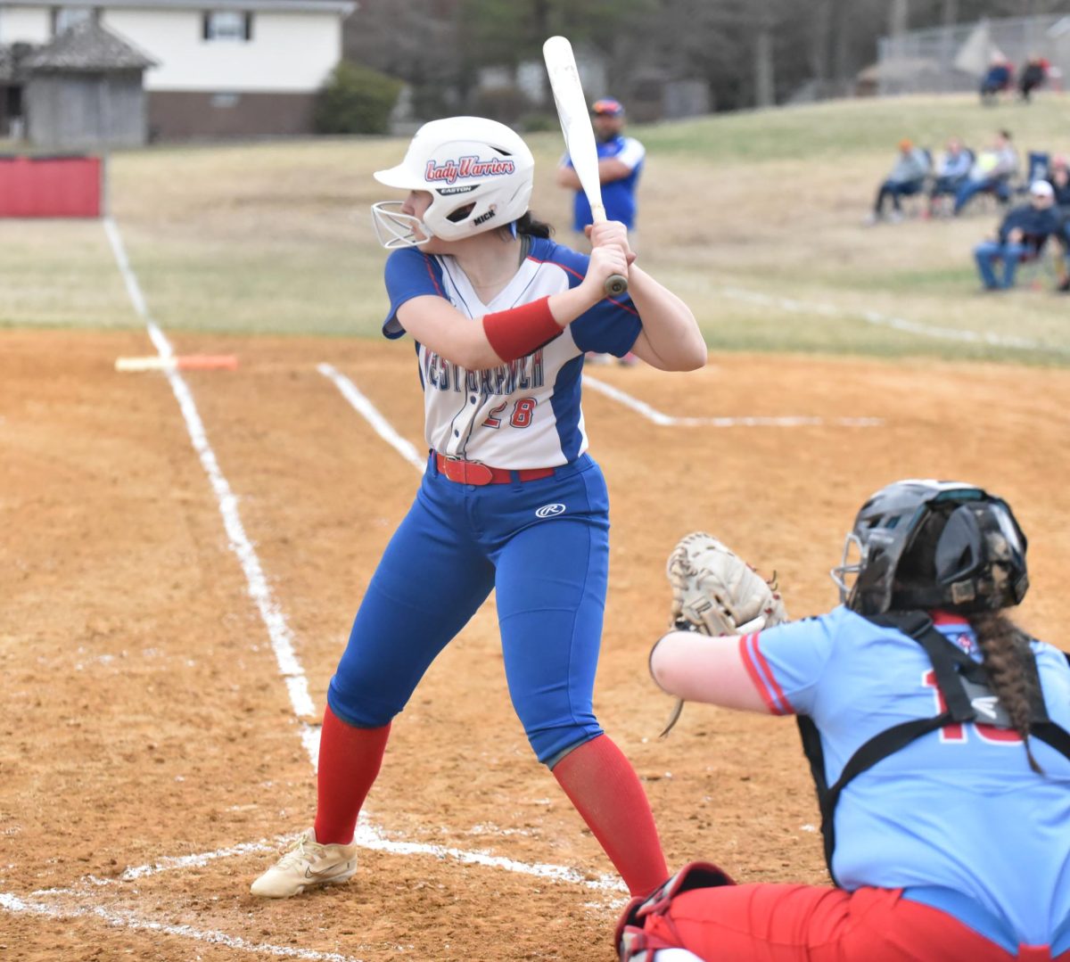 Makena Moore steps up to the plate during a key at-bat.