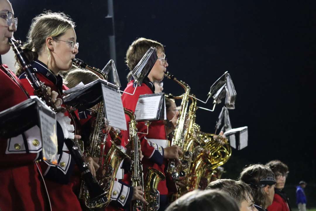 The West Branch Warrior Band saxophone section plays during the game
