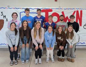 The Homecoming Court gathers for a group photo, ready to kick off a week full of excitement and school spirit.