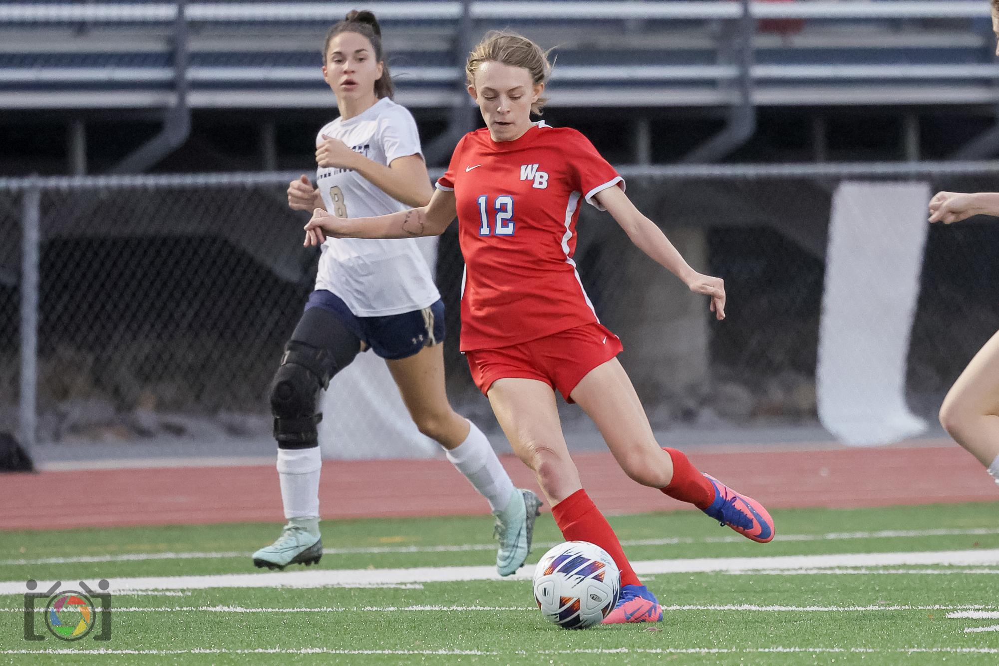 Sydney Sankey takes her shot for a goal. Sankey has scored 13 goals this season.

