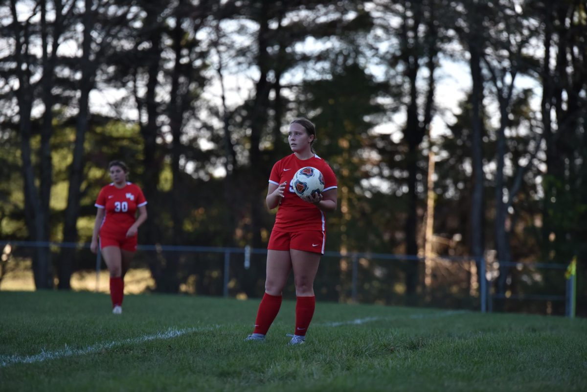 McKenzie Harbold surveys the field to find an open Warrior.