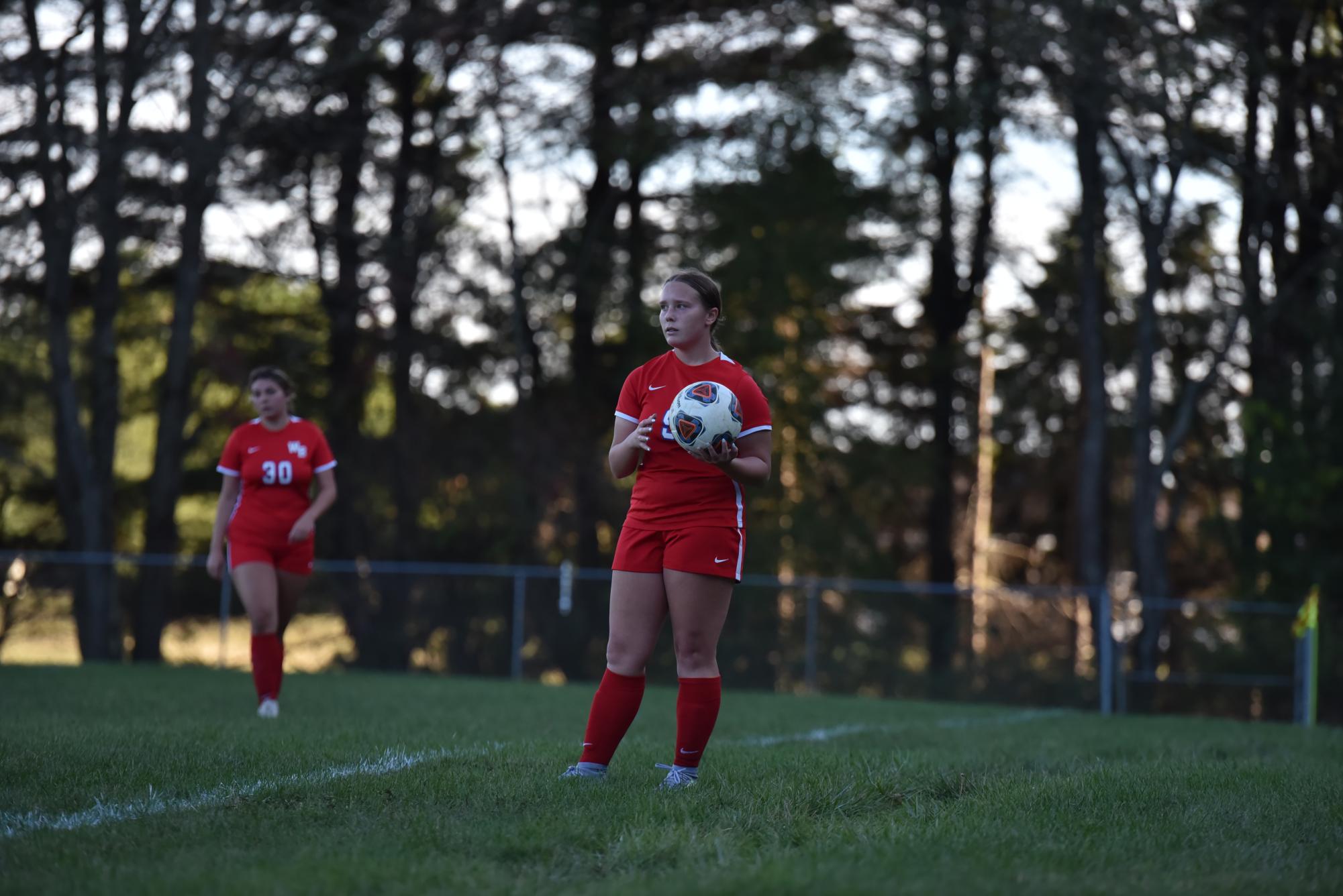 McKenzie Harbold surveys the field to find an open Warrior.