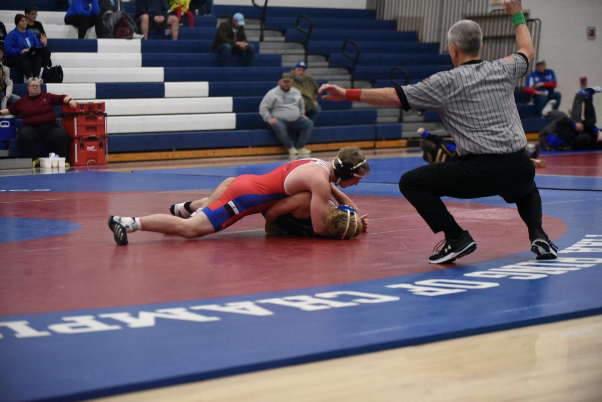Sample fights against his opponent in a match he won by a tech. fall 17-0. 