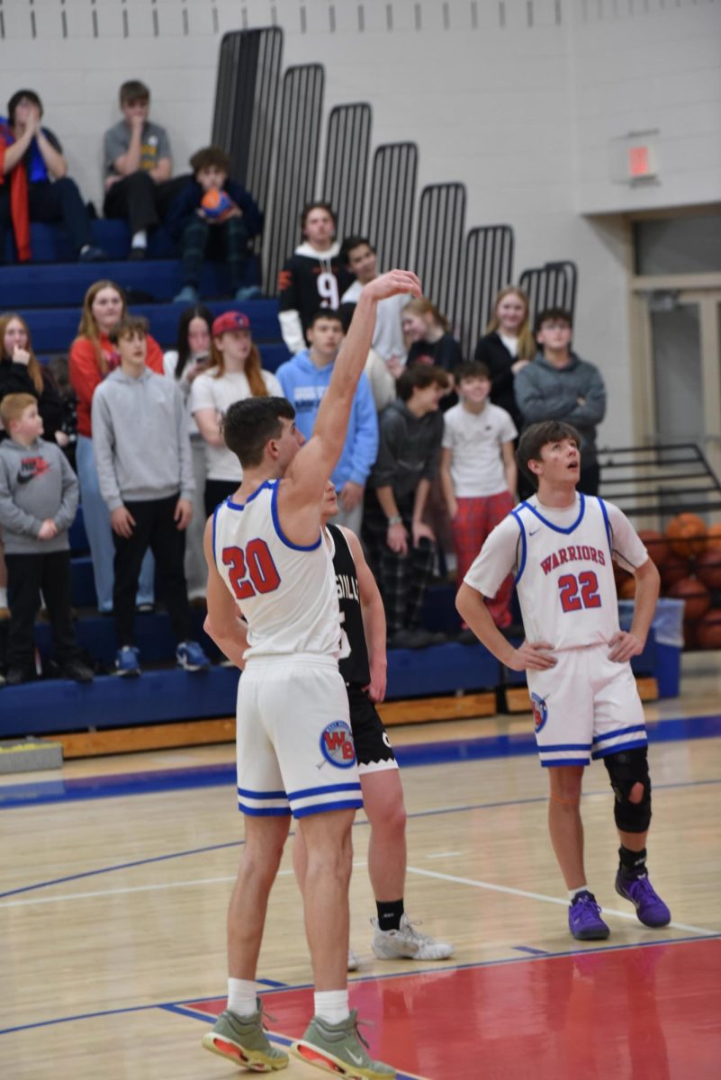 Evan Emigh sinks his free throws to help the Warriors take the lead.