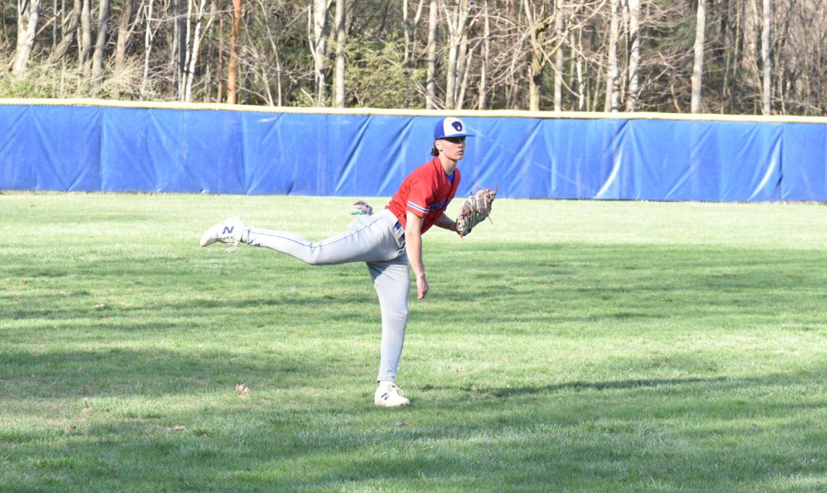 Kaleb Warren-Kio throws the ball from the outfield during a game against Tussey Mountain.