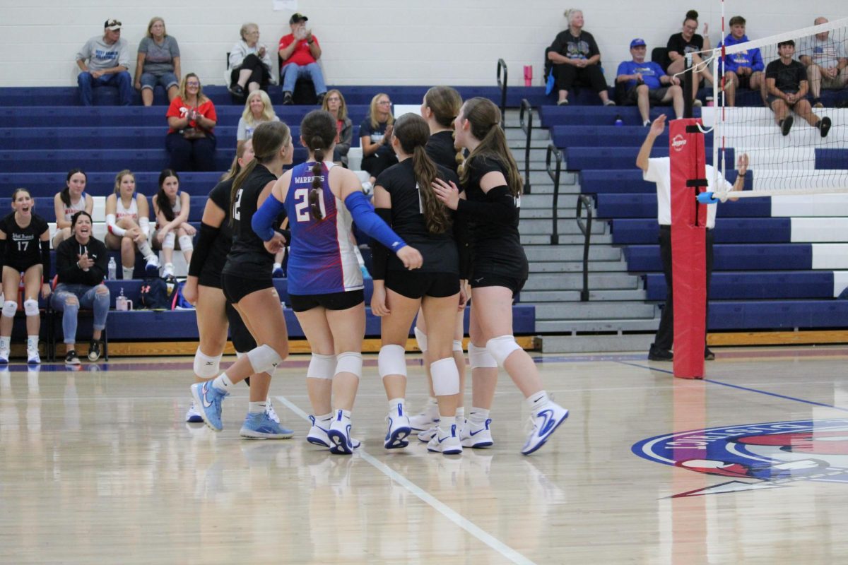 The Warriors celebrate a point against Claysburg-Kimmel High School.