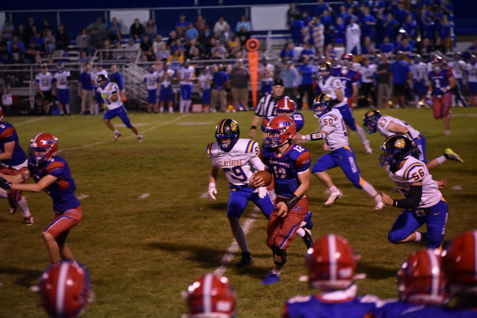 Quarterback Conner Danko rushes up the sideline for a first down.