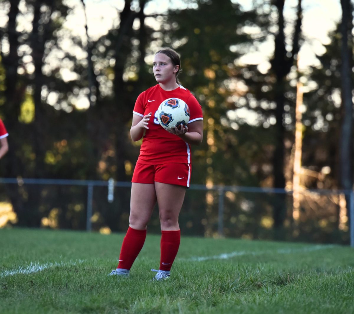 McKenzie Harbold gets ready to throw a ball in during a game last year